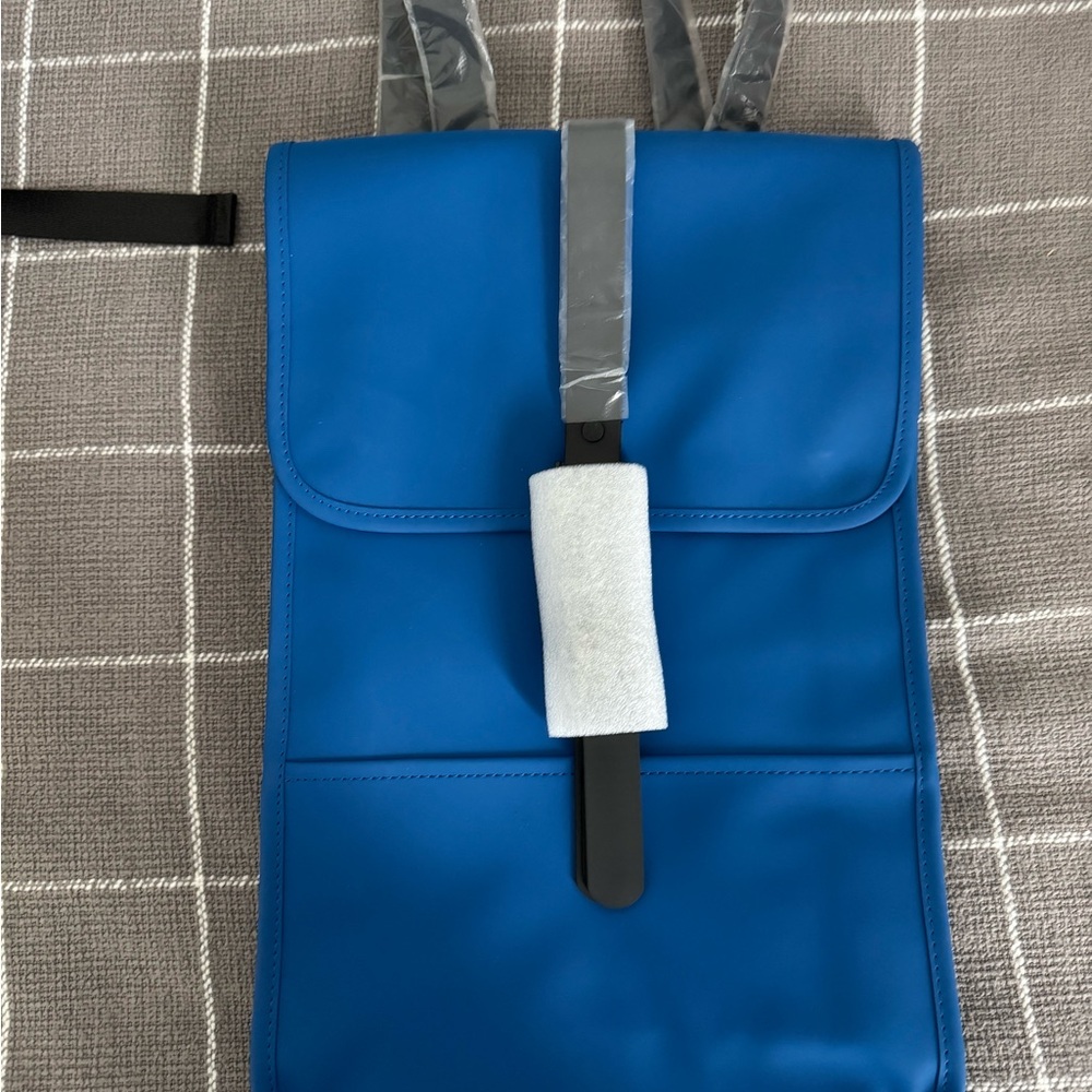 Rains Waterproof Backpack in the color Waves